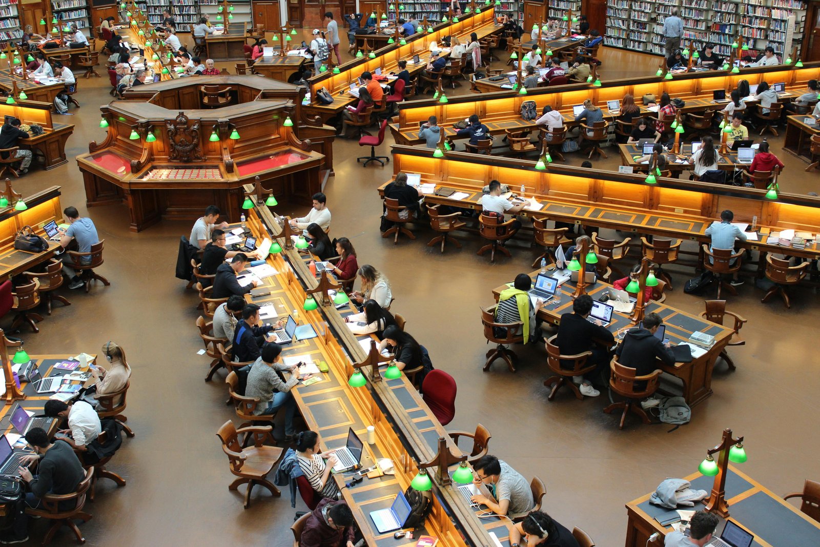 A huge library where students are studying and preparing for their exams