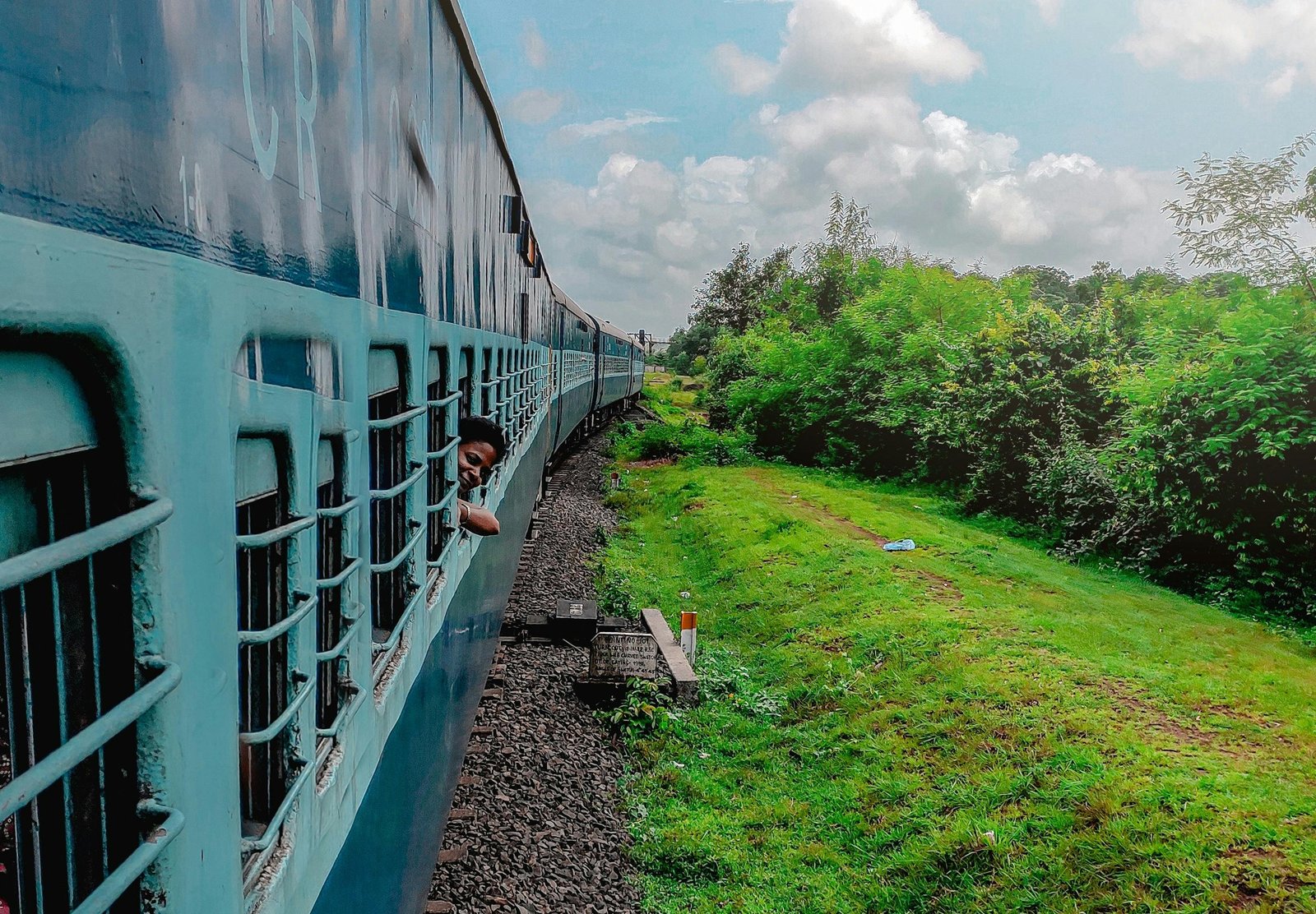 A passenger through train of Indian Railways standstill on a track